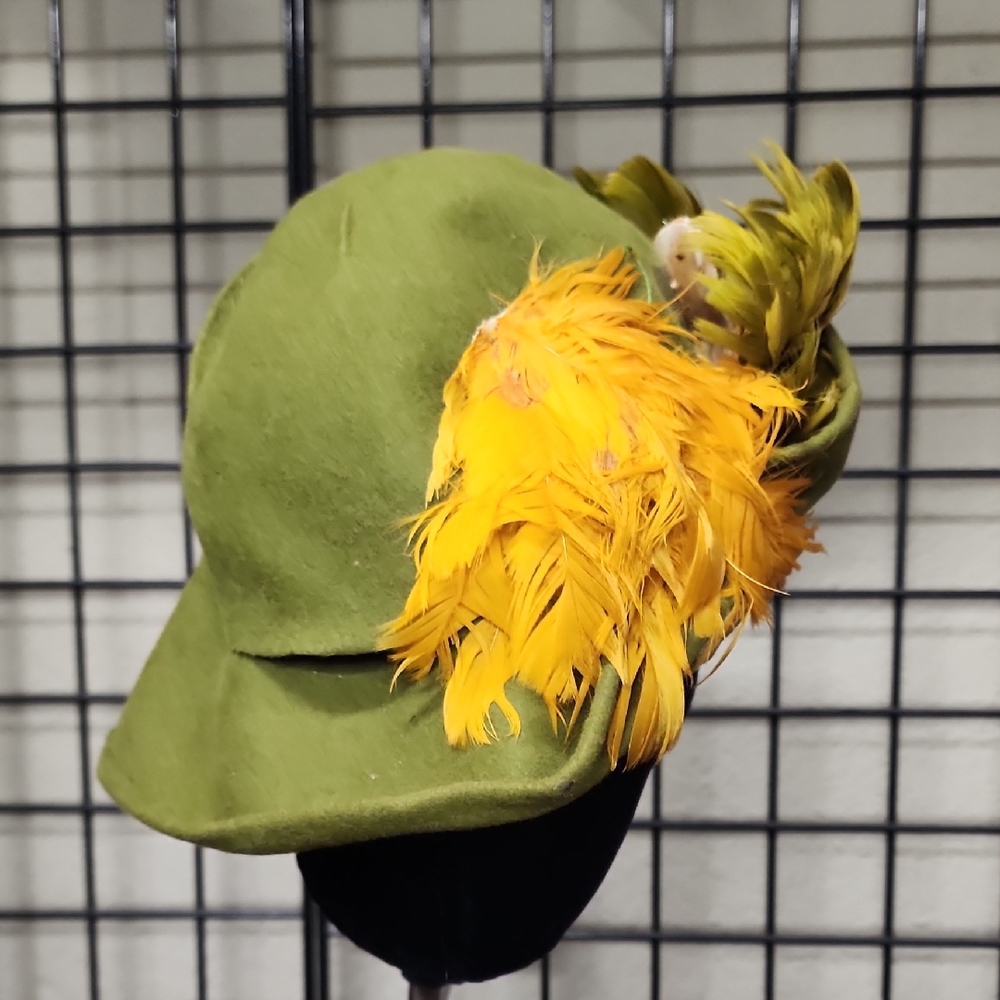 Green Vintage Hat with Yellow Feather Accent